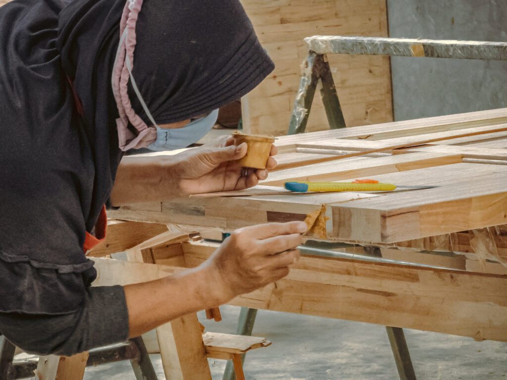 Precision assembly of engineered wood door core layers in Unitree factory