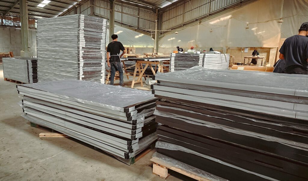 Final quality control check on FSC-certified wood door before packaging